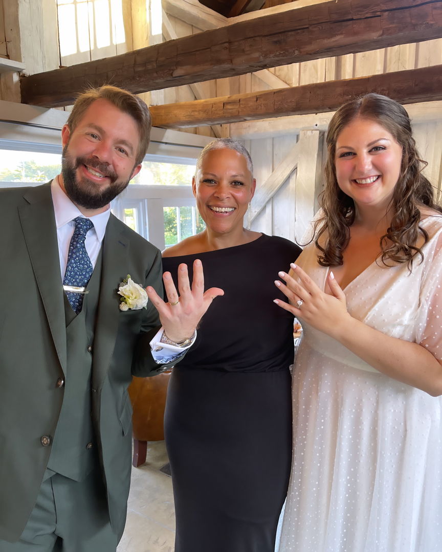 Julia & Greg with The Officiant after saying 'I do!'